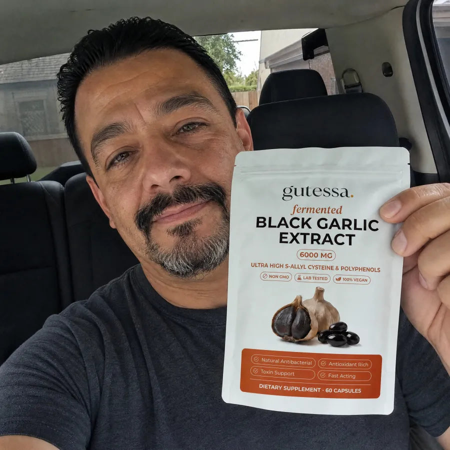 Luis holding his Gutessa pouch in his truck