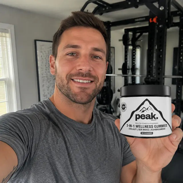 Customer holding a jar of Peak 3-in-1 Wellness Gummies